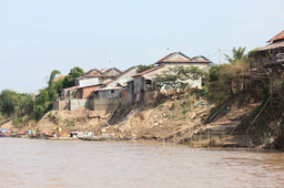 River bank collapse and sand mining: unsustainable practices threaten riverside dwellers