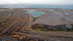 Wind-blown lake mud records 10 000 years of Arctic storminess   