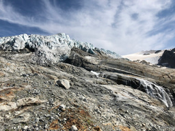 Soil microclimate heterogeneity buffers the severity of warming trends in proglacial landscapes