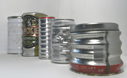 Crushing soda cans and the mathematics of corrugation formation