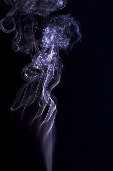 Turbulence forming from a rising column of smoke. 