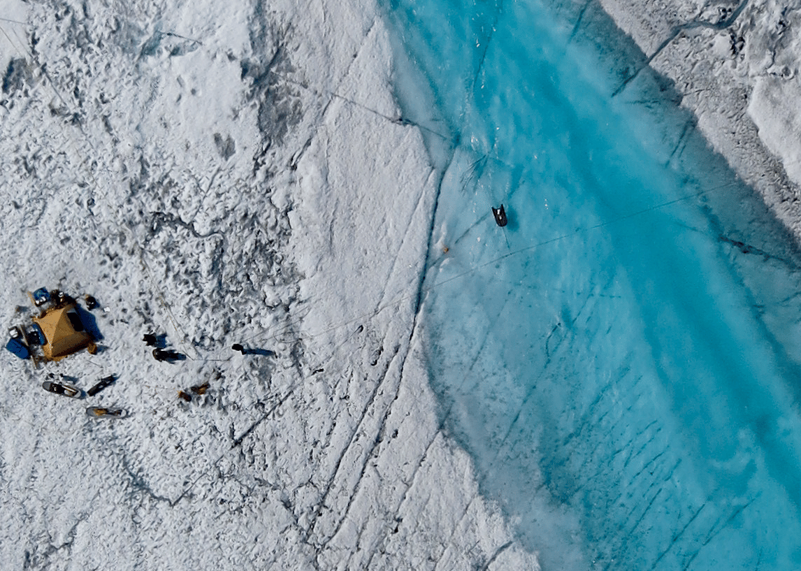 An image of the river cross section where discharge measurements were made, showing the Acoustic Doppler Current Profiler being towed across the river.