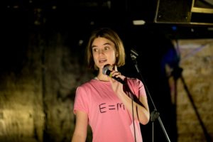 Francesca Chadha-Day holding a microphone