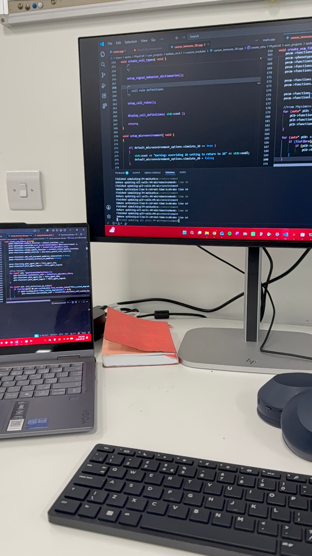 Two monitors with code 