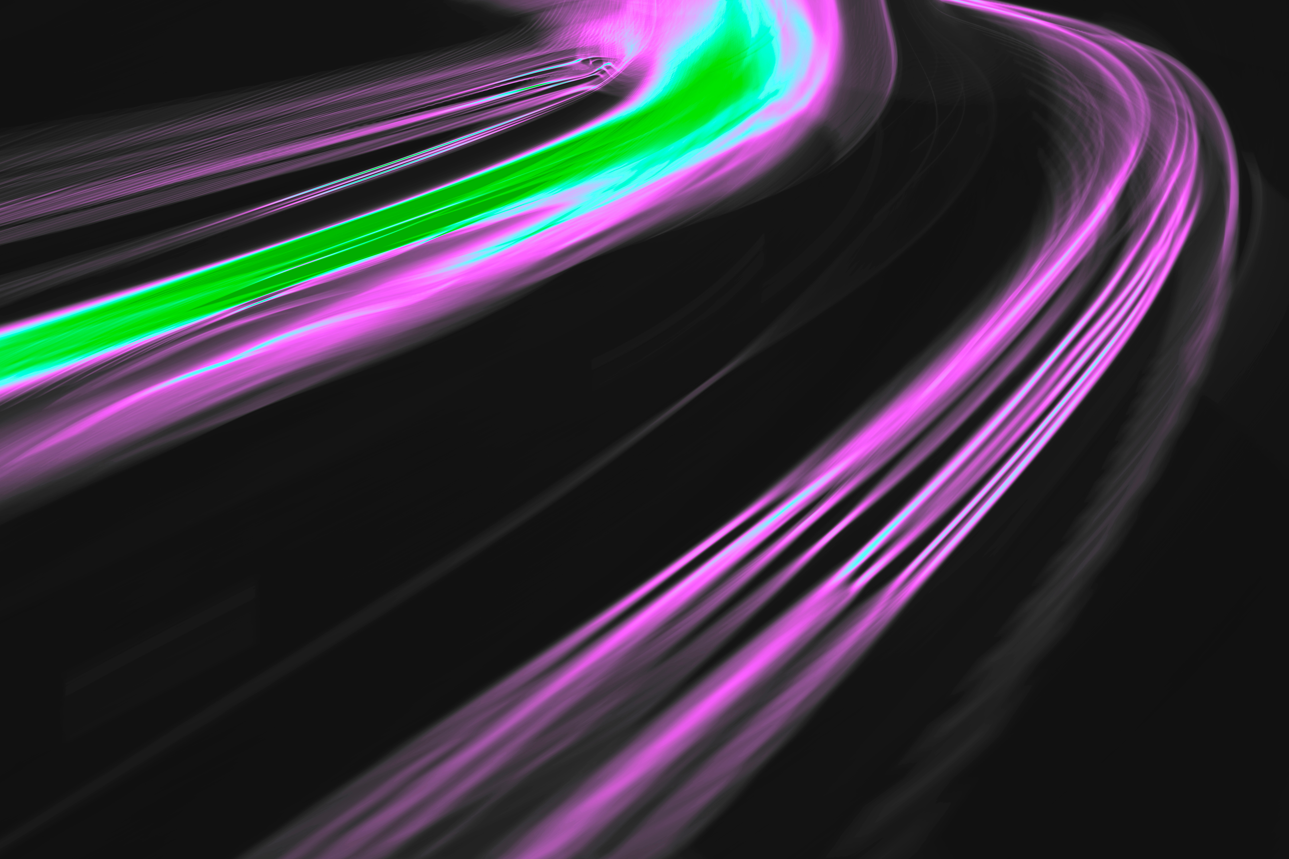 An abstract image with a purple and green swirl 