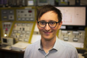Ed Simpson in an accelerator control room