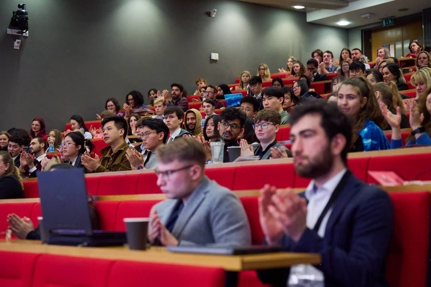 BCUR attendees at the opening speech, rows of undergraduate students in an LSE lecture hall.