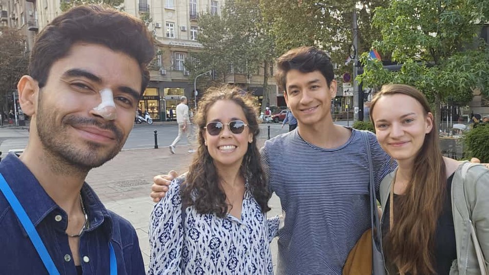 Group photo of four young people.