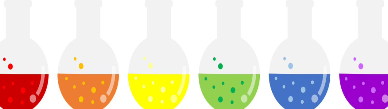 round bottom flasks filled with bubbling liquid arranged by colors of the rainbow