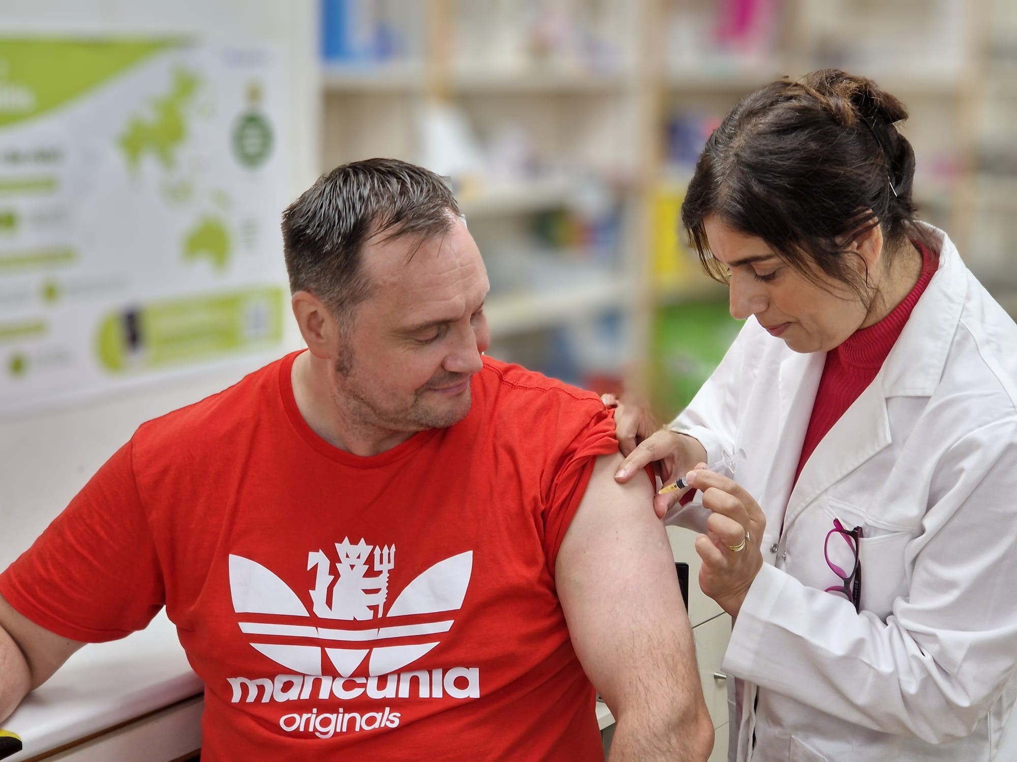 Nabila Malik vaccinating a customer