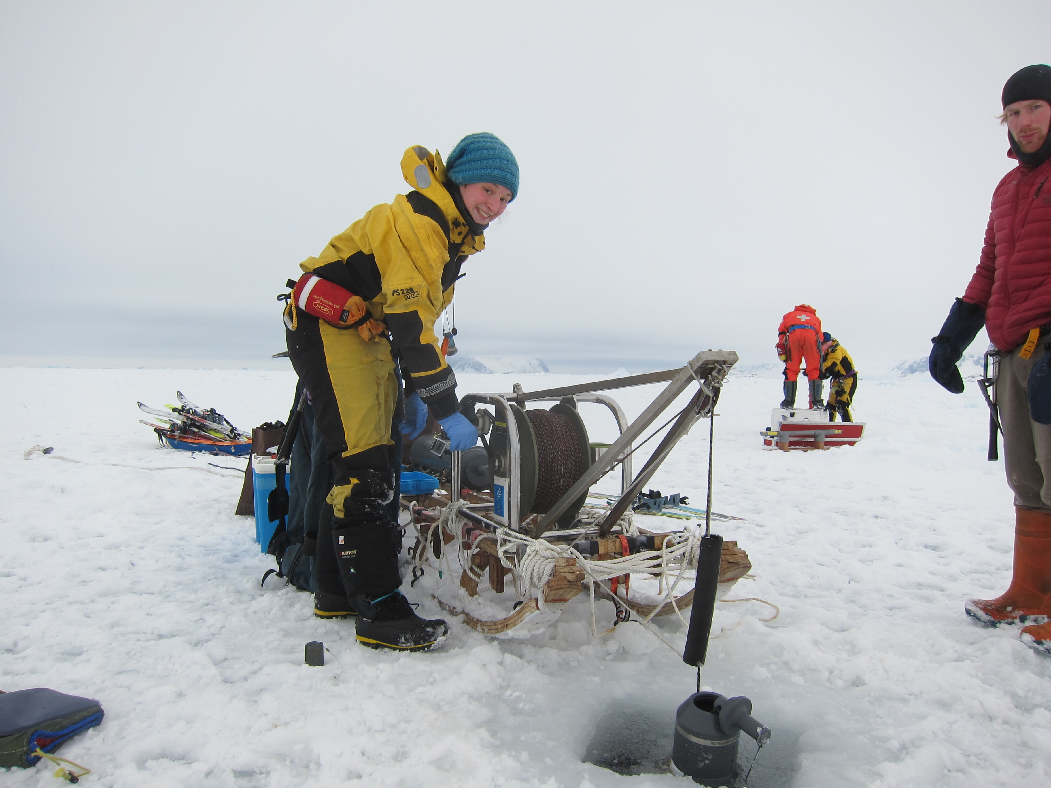 People on sea ice with oceanographic equipment