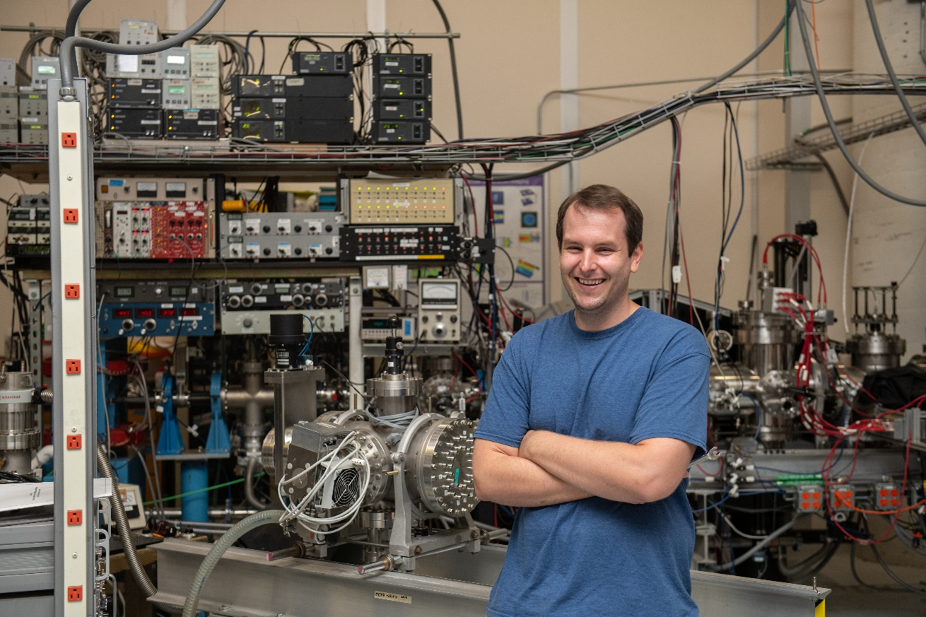 Fig. 2:  Dr. Travis Severt in the J.R. Macdonald Laboratory at Kansas State University.
