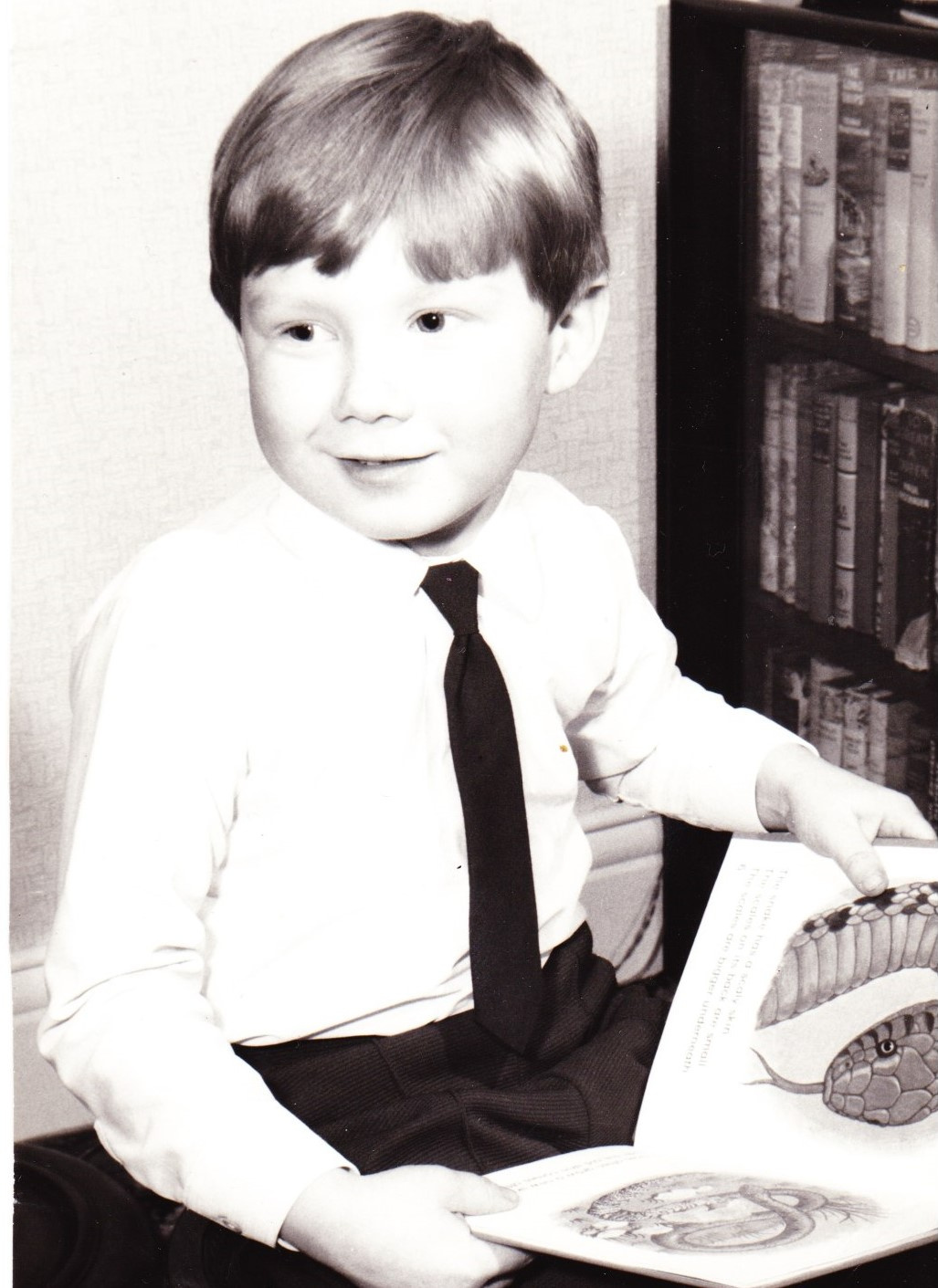 My first book on nature Picture of David aged 5 reading a book about snakes