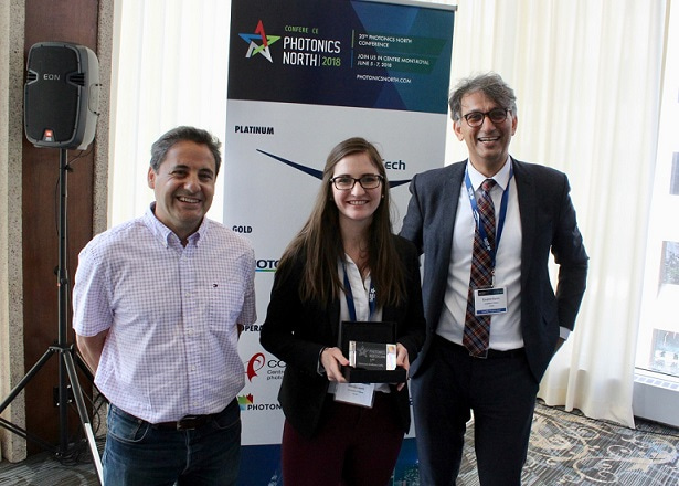 Amanda Lewis receiving her award at Photonics North