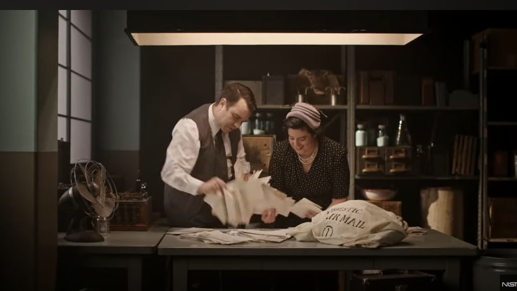 A re-enacted scene from the film The AD-X2 Controversy. The company is flooded with requests for its battery additive.  