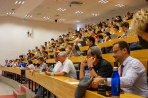 Attendees sat in a lecture thetre
