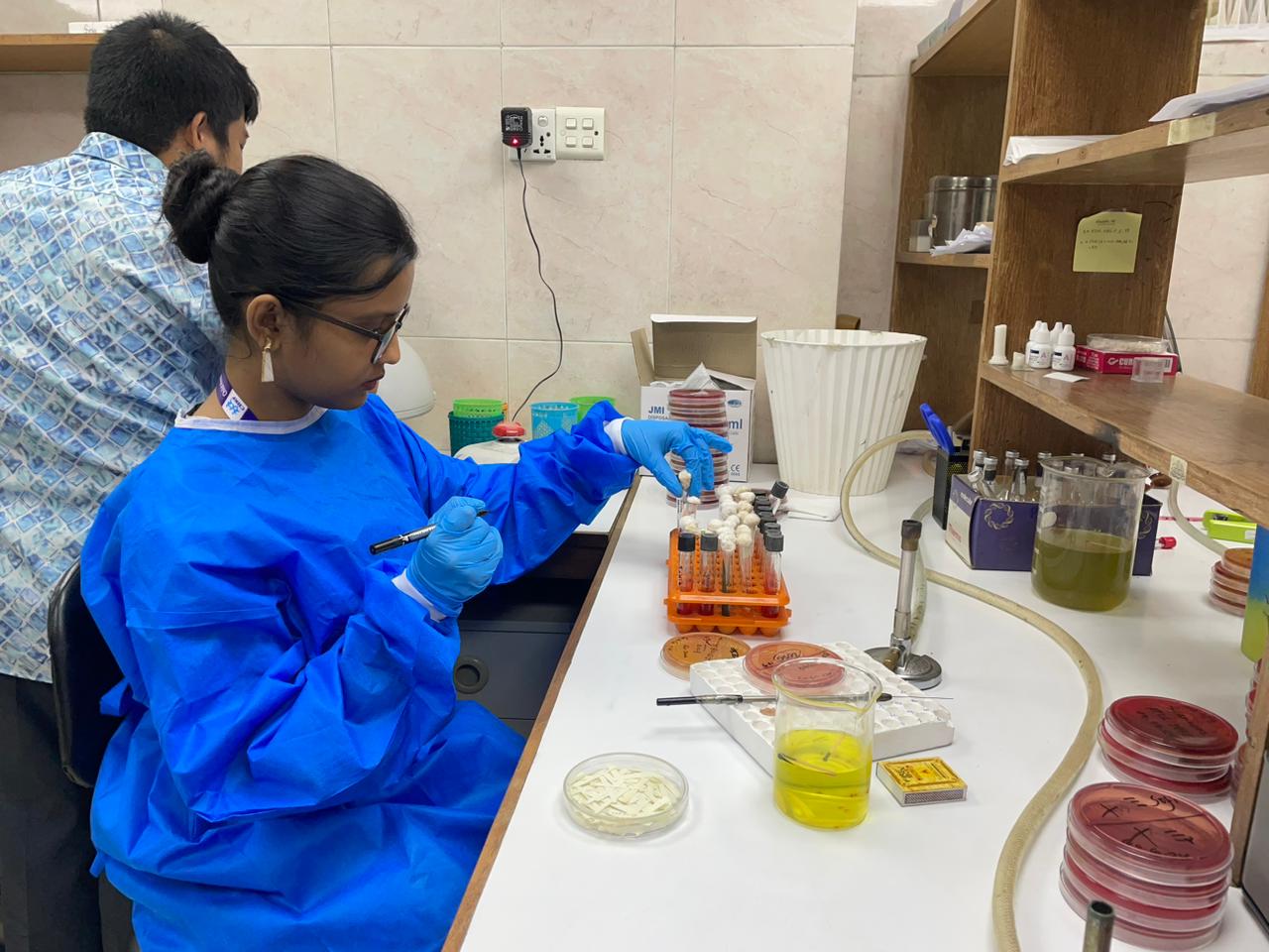 Naziba Sayem working in the microbiology lab of a paediatric hospital