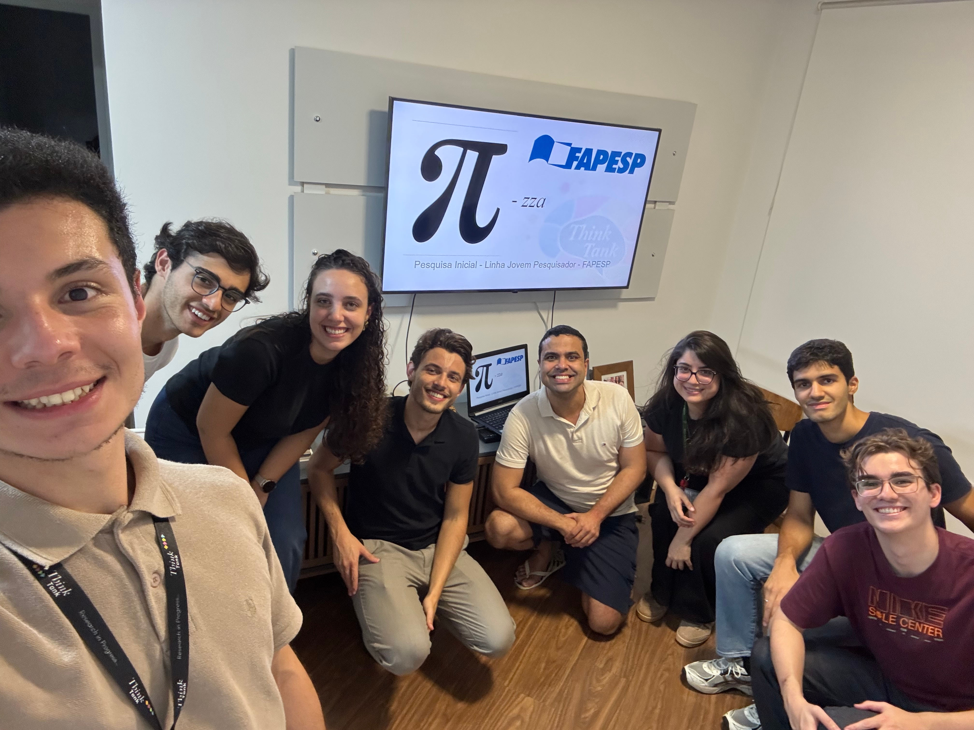 Celebrating a granted proposal – the ThinkTank Cafezinho way. Pizza, laughter, and the kind of exhaustion that only comes after good hard work.