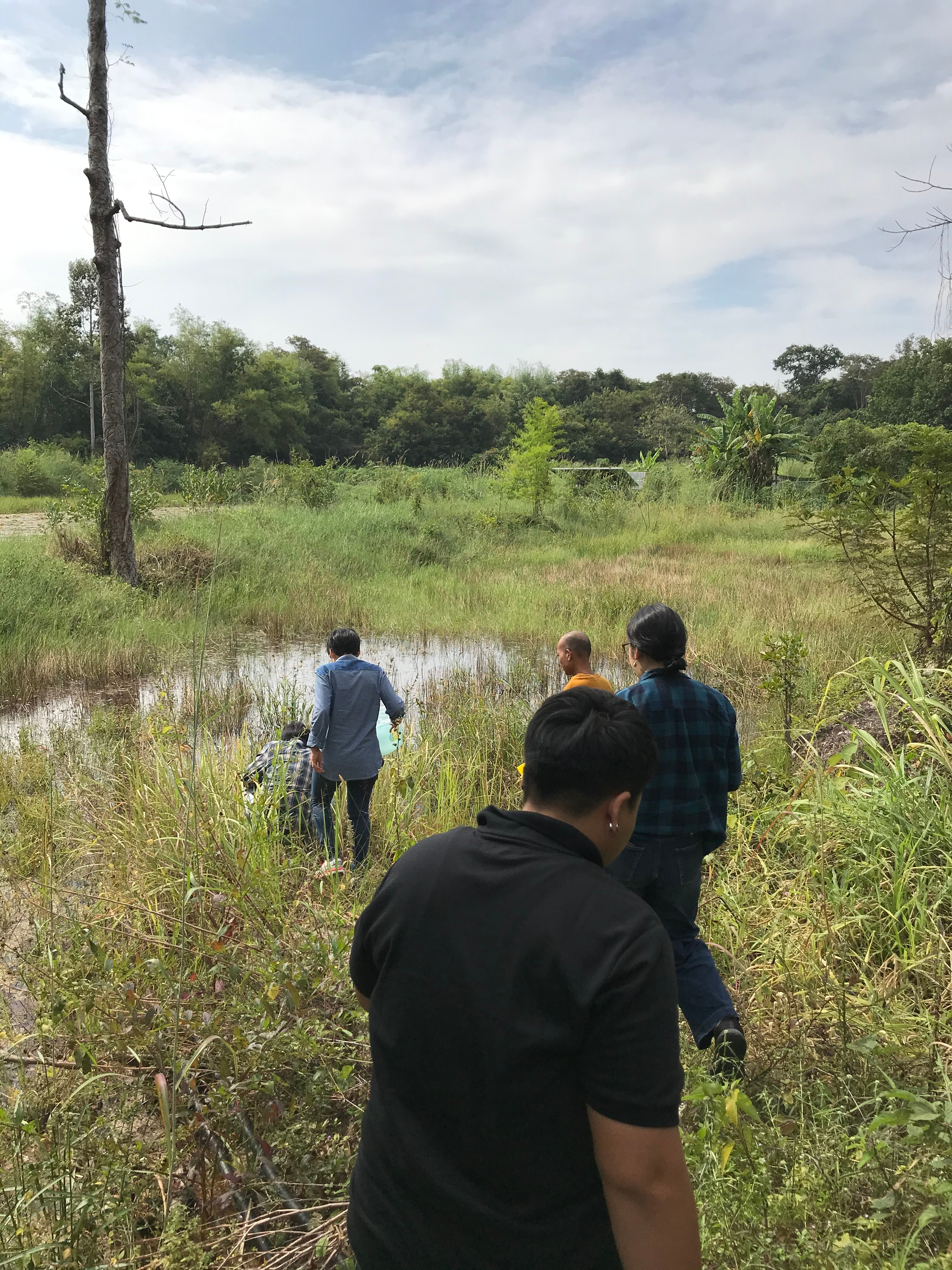 Help from the local communities: A Buddhist monk was leading the way to the water source 