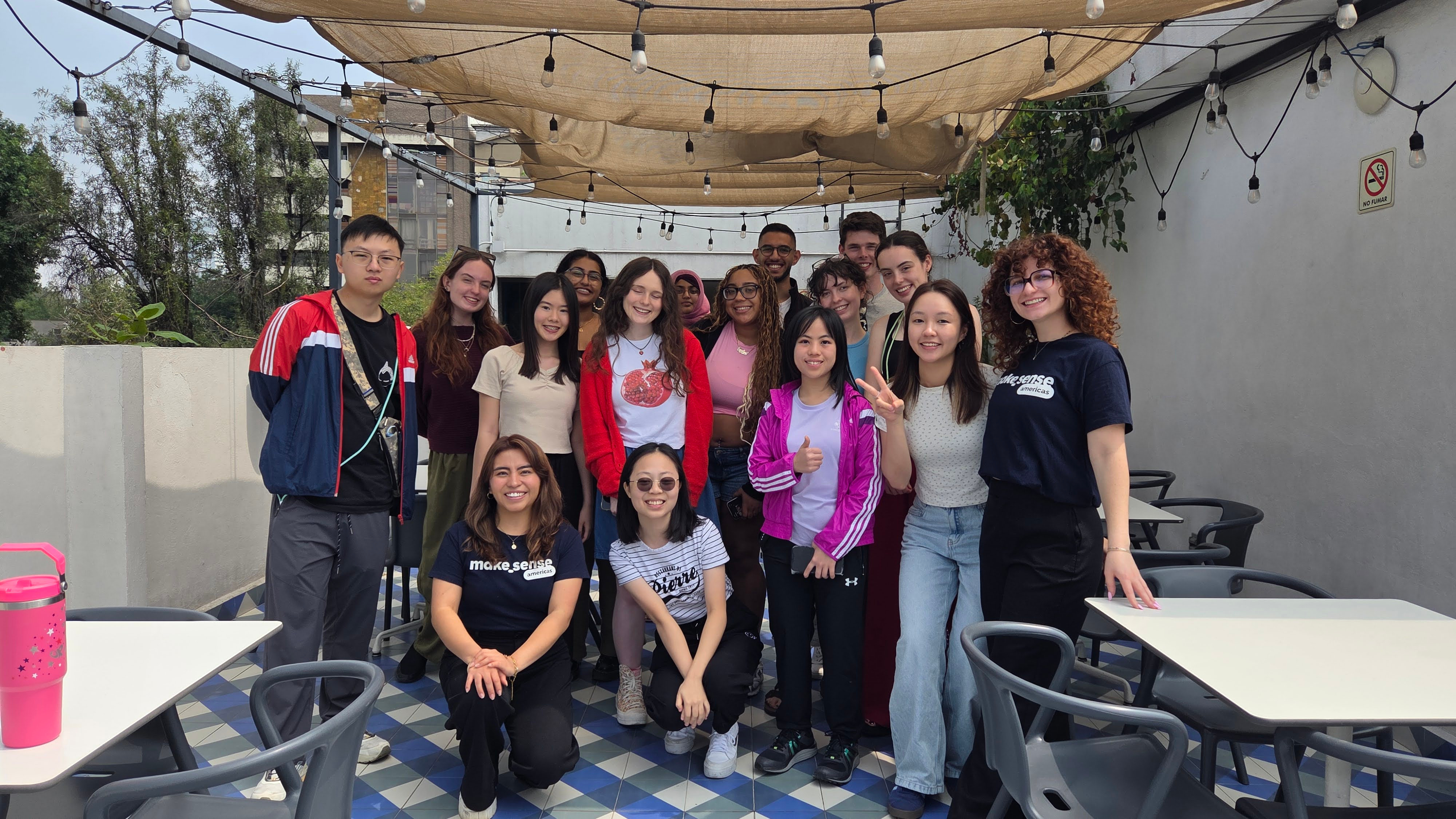 Image of a group of people in Mexico City on a terrace.