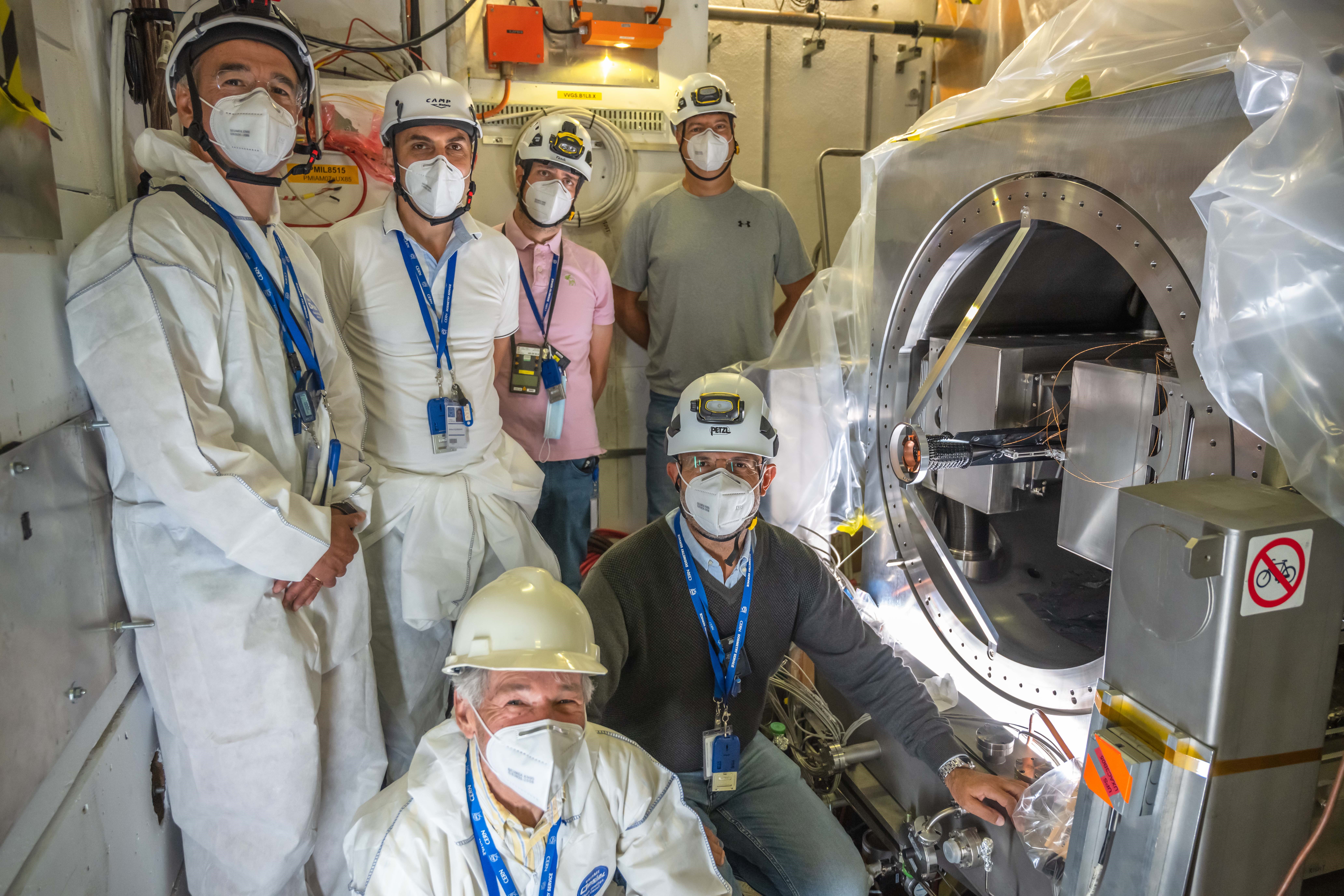 Part of the SMOG2 group installing, in front of the LHCb detector, the first gas fixed target at the LHC.