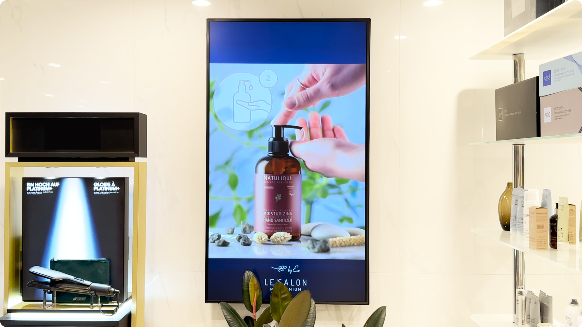 digital signage display at millennium smart building's hair salon