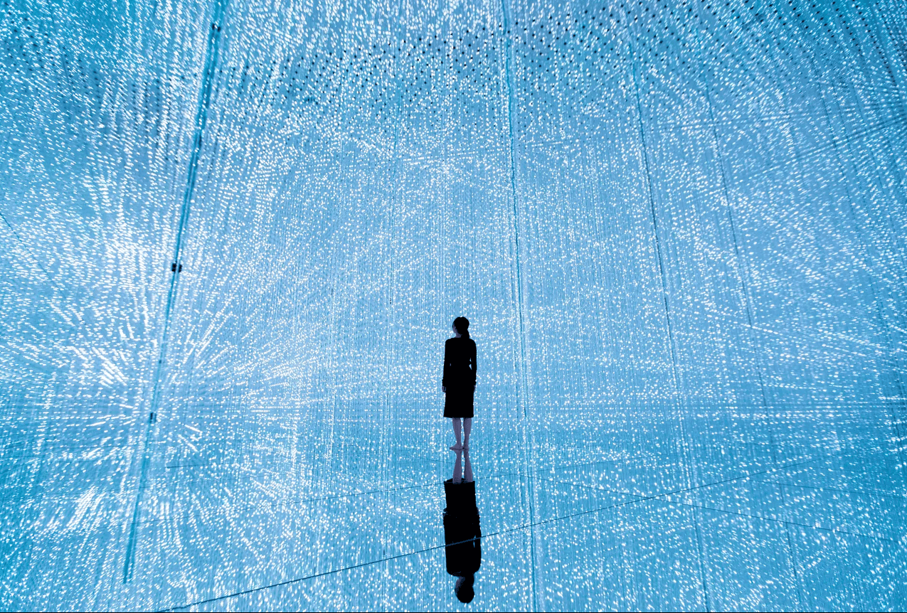 Woman standing in teamLabs exhibit