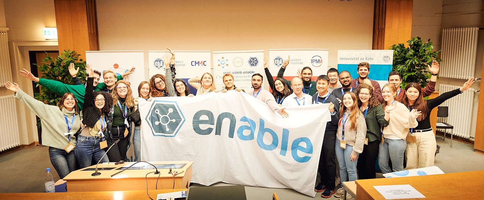Group photo of the international scientific organising committee of FEBS-IUBMB-ENABLE Conference, an event organised by and for young researchers