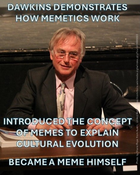 Meme showing a photo of Richard Dawkins sitting at a table, with text above saying "Dawkins demonstrates how mimetics work" and text below saying "Introduced the concept of memes to explain cultural evolution, became a meme himself"