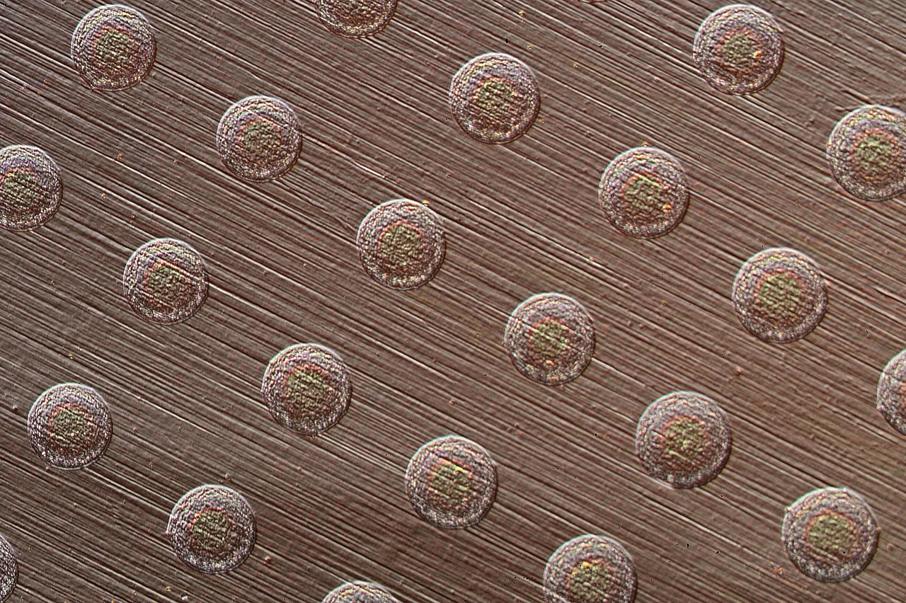 Autoperforation of Two-Dimensional Materials for Generating Two Terminal Memristive Janus Particles  - How can 2D materials self-assemble into autonomous electronic devices?