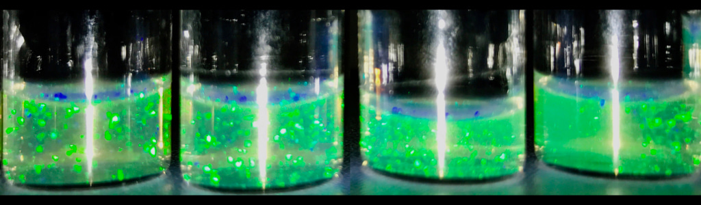 Exploring the colloid-to-polymer transition for ultra-low crosslinked microgels from three to two dimensions