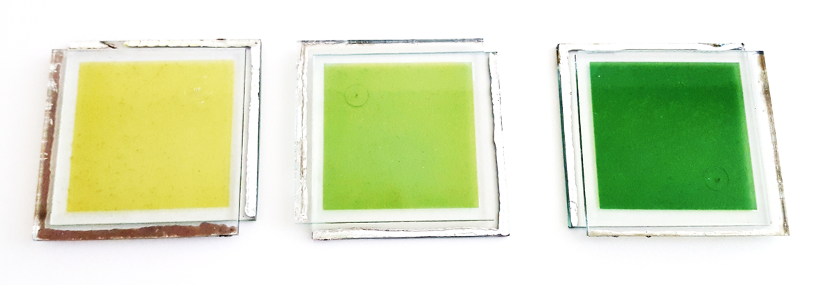 Photochromic dye-sensitised solar cells with light-driven adjustable optical transmission and power conversion efficiency 