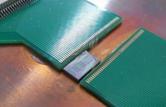 Space-efficient optical computing with an integrated chip diffractive neural network