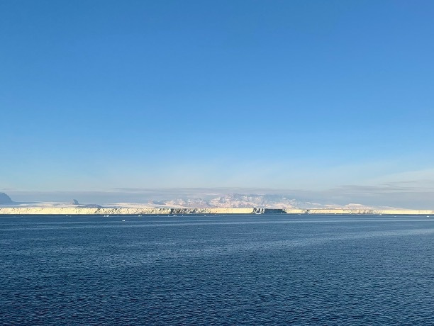 Underwater glider observations reveal eddy-driven heat transport near an Antarctic ice shelf