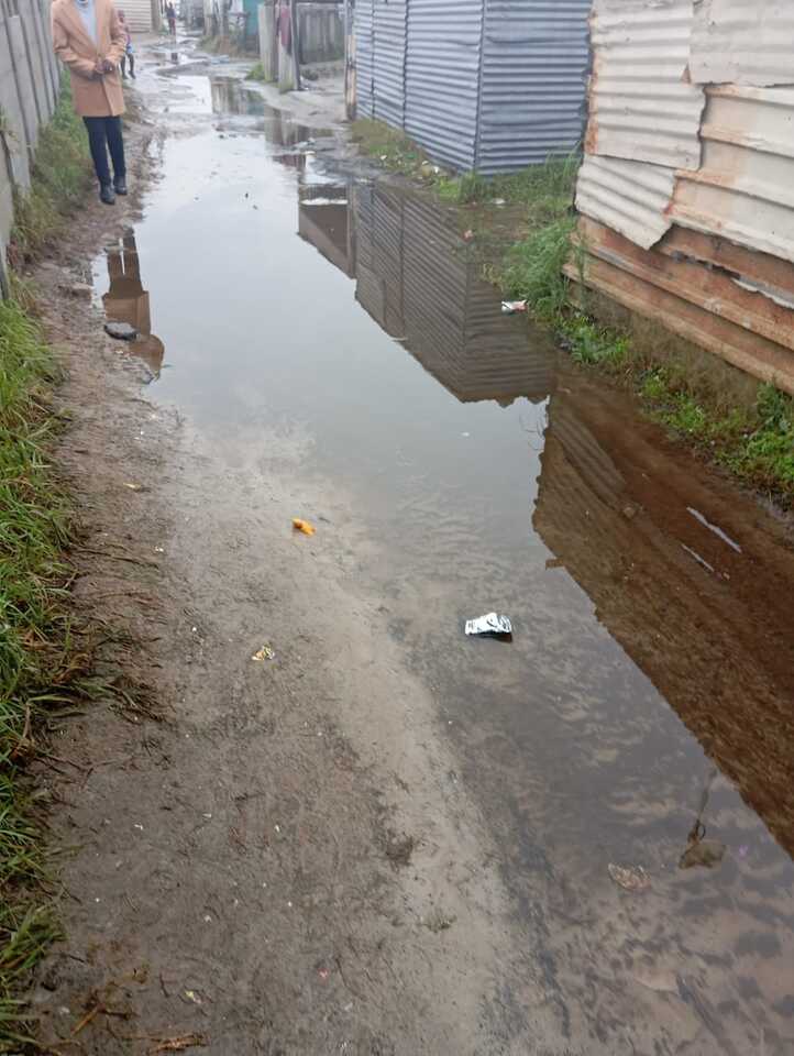 Adapting from Below: Flooding, Informality, and the Power of Community Resilience