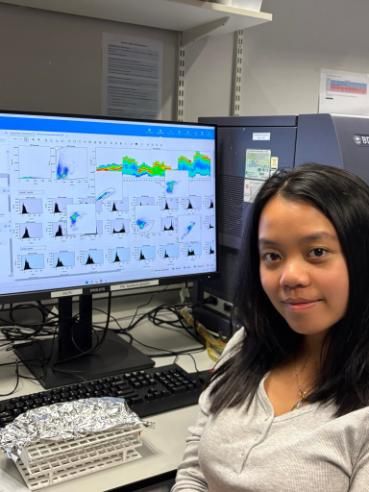 Student sitting in front of a desktop