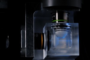 In light-sheet microscopy, a sample is illuminated with a thin sheet of light and fluorescence is detected by a separate lens placed orthogonally to the excitation light. 