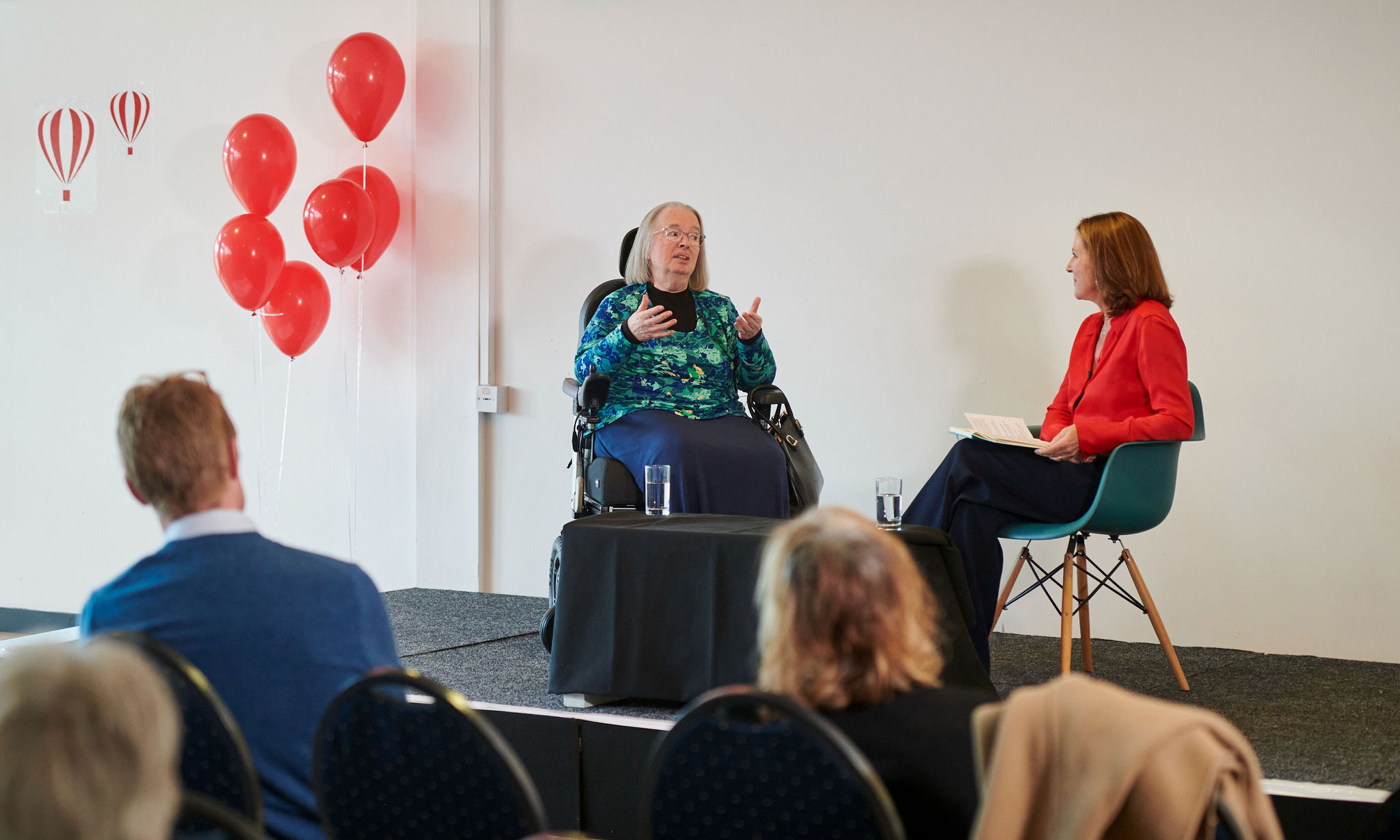Professor Jean Golding in conversation with presenter Ali Vowles at an event in 2023