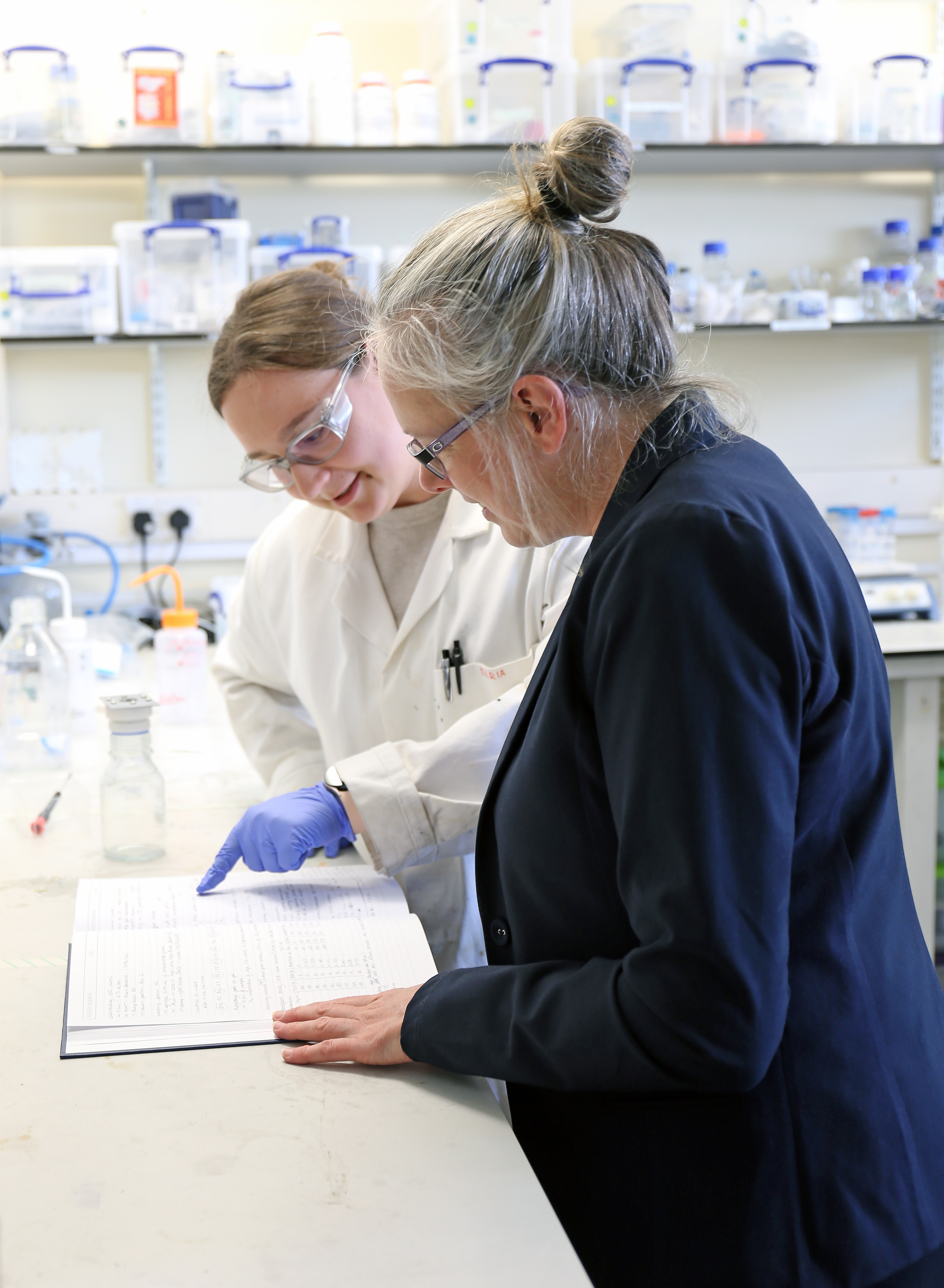 Daria and Kylie looking at results