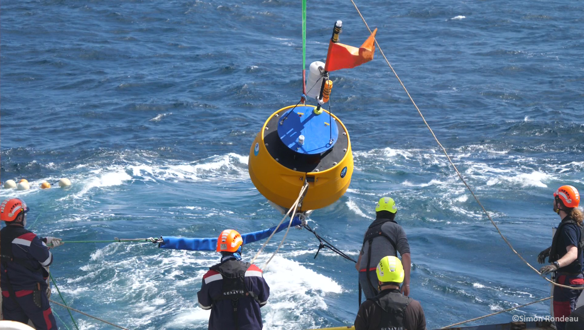 Deployment of the 1 km-long mooring line by the seamen