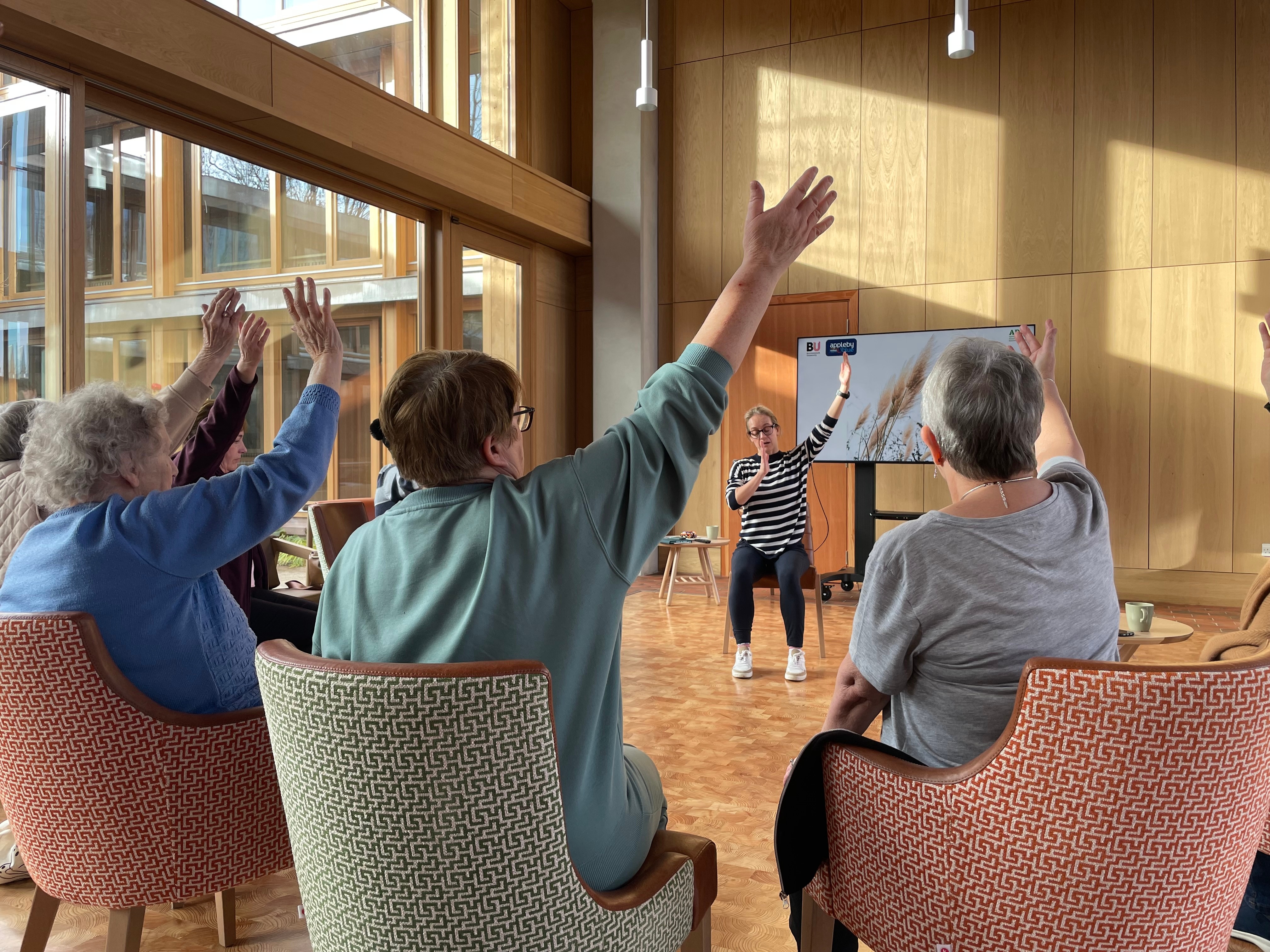 Participants at a strength and balance activity