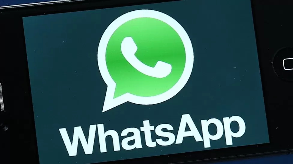 WhatsApp logo on phone screen WhatsApp logo on phone screen