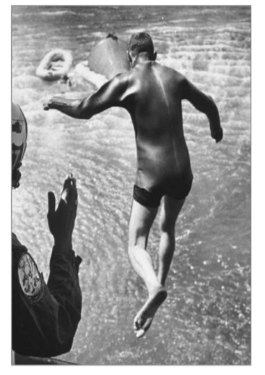 Carpentier practicing for recovery of astronauts from a water landing. 