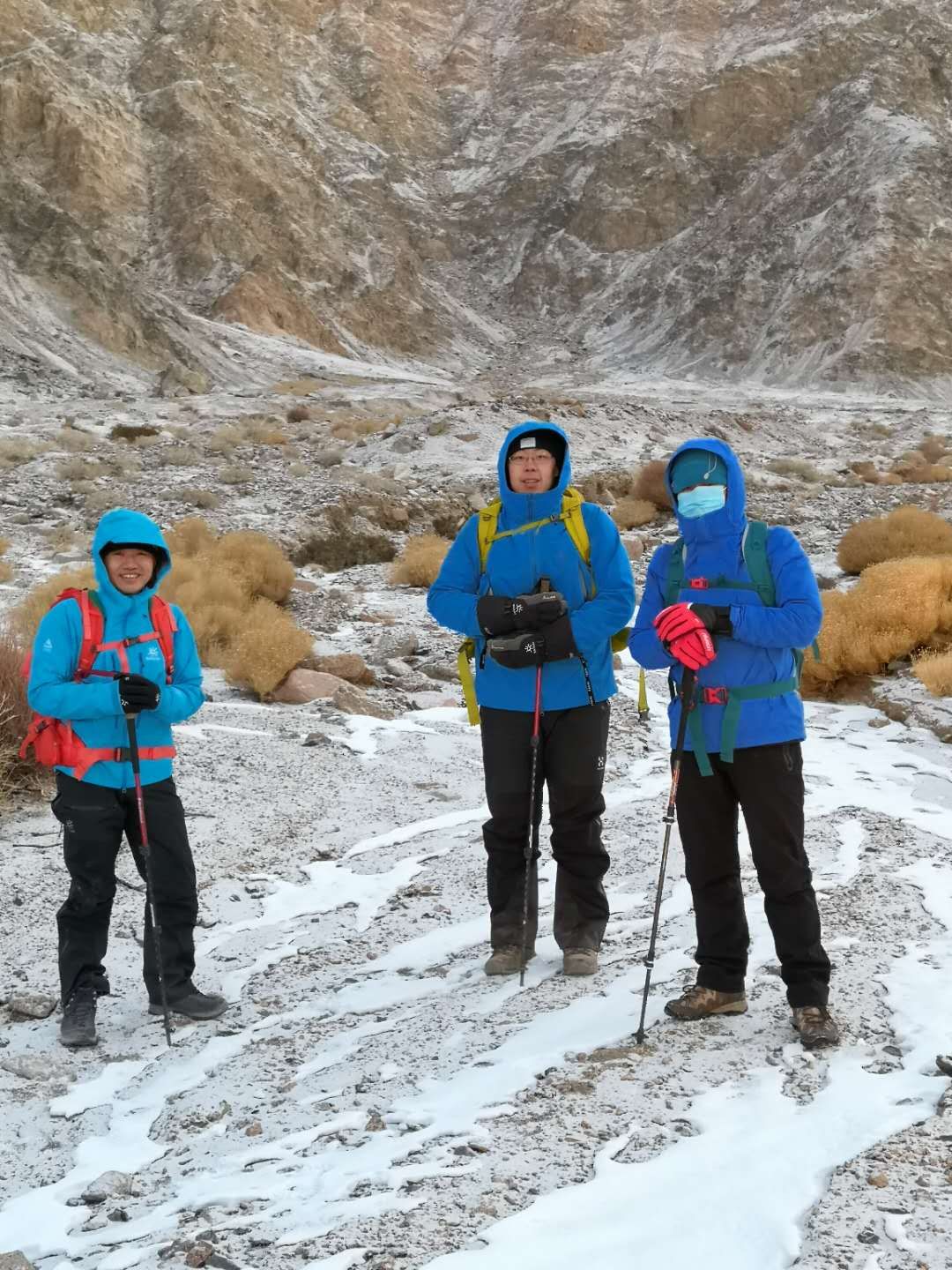 L. Deng, F. Yang and C. Tian (left to right) on a trip to mountain top. From this point, 3 hours climbing is needed. The route was wild, mostly cliffs.