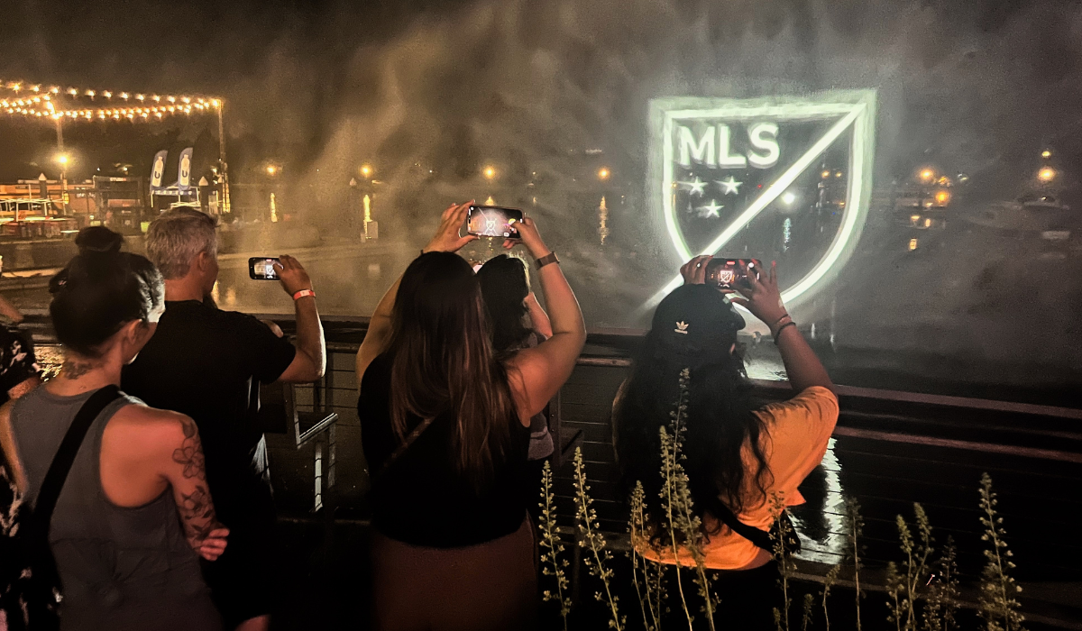 People Filming Water Screen Projection Braded Content