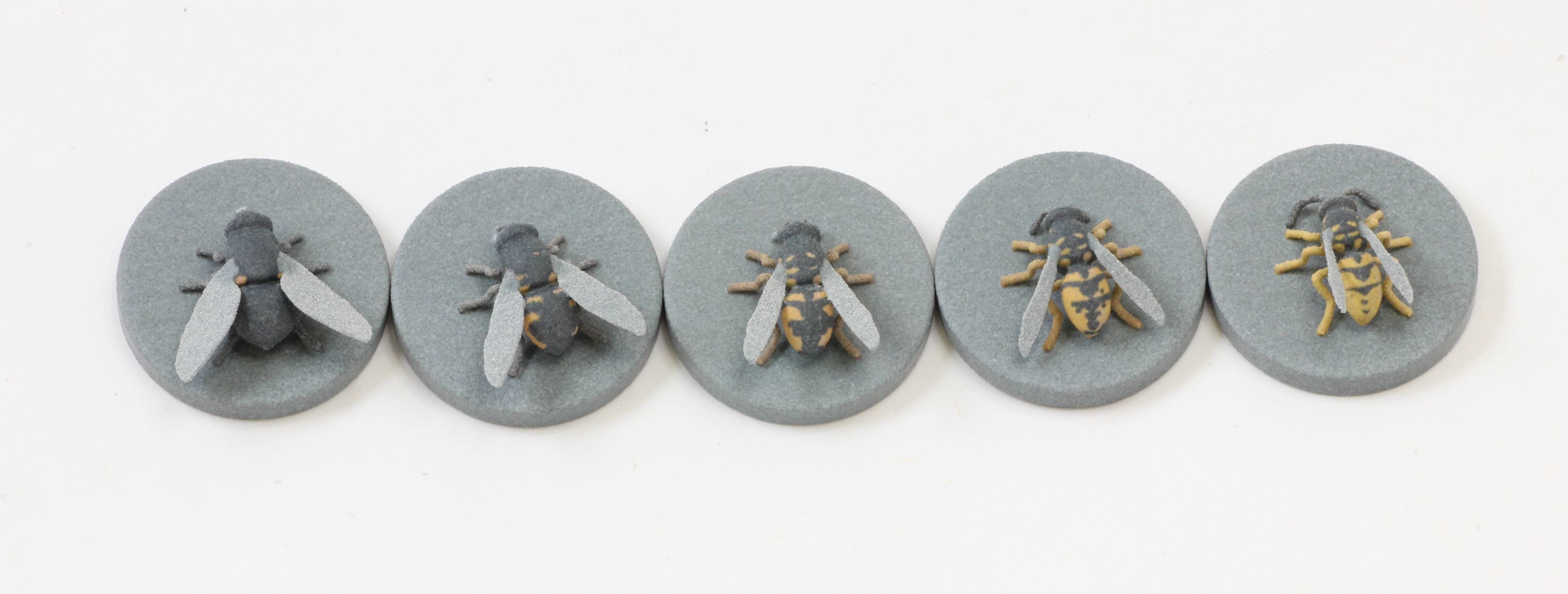 A series of colourful 3D printed insects