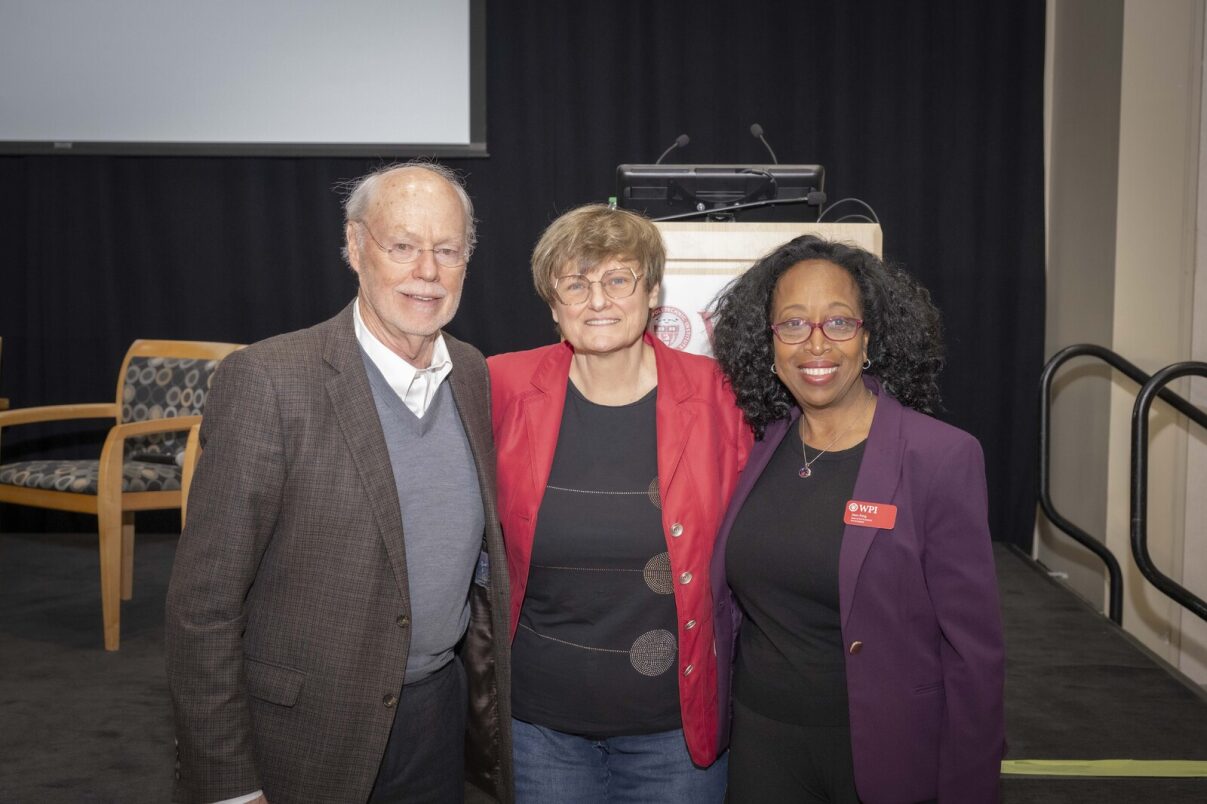A smiling photo of Dr Jean King (middle) with Nobel laureates Dr. Phil Sharpe and Dr. Katalin Kariko