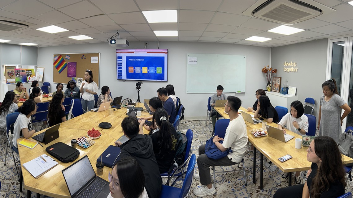 SCDI’s Trang Minh Nguyen, program manager for harm reduction and addiction treatment and children and youth programs, speaks to the team in preparation for work with VACEP storytelling partners in the SCDI offices in Hanoi.