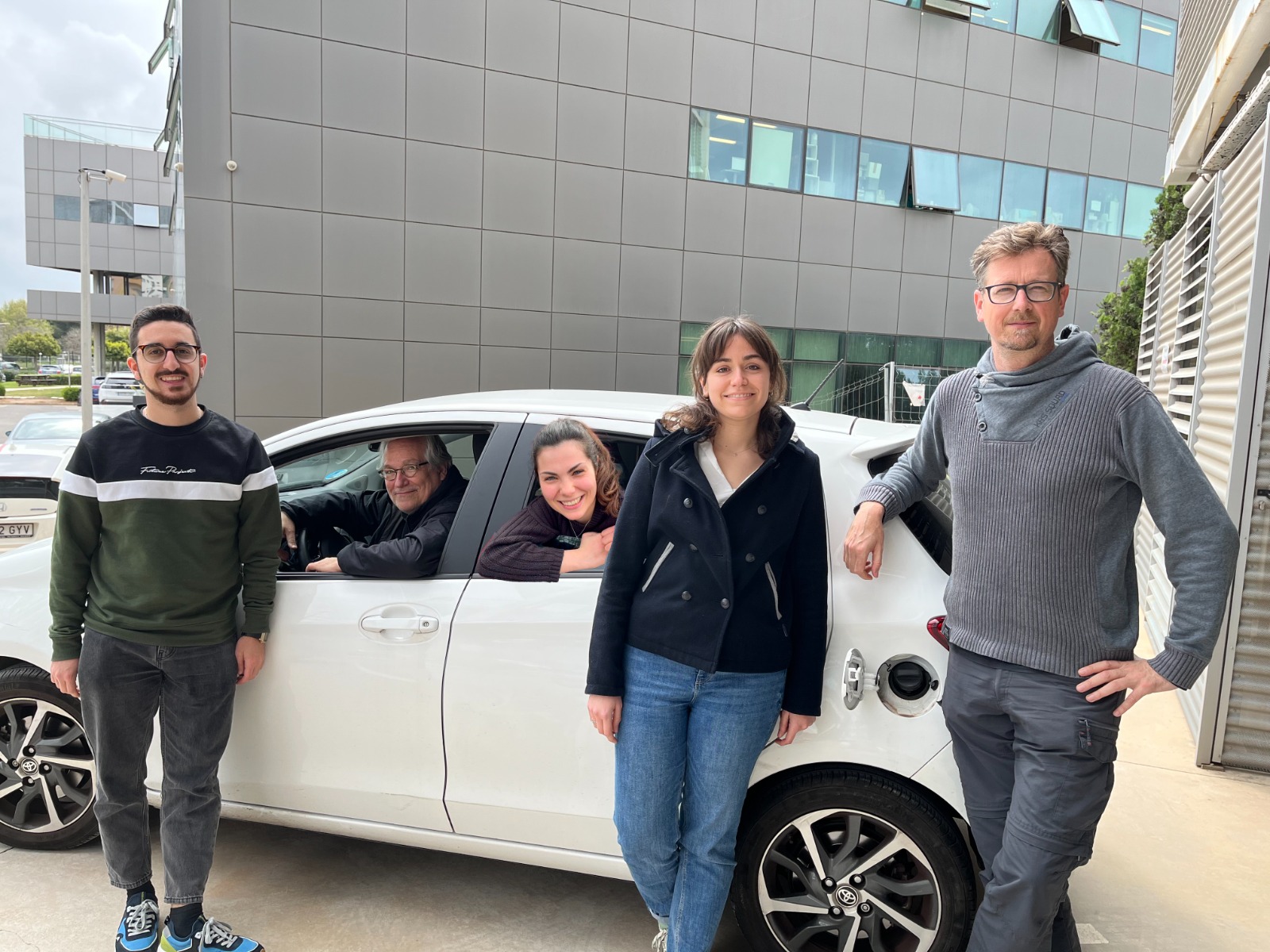 The authors with the car from which a new diesel-degrading bacterium was found