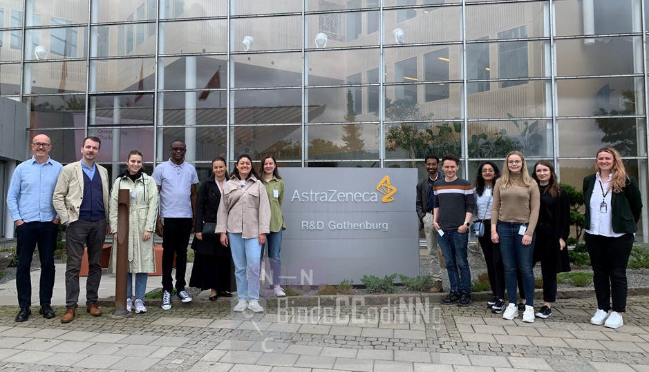 Group photo in front of AstraZenaca's location.